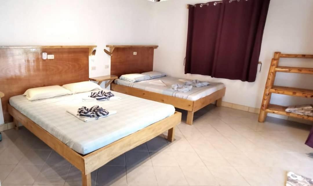 Sulu Sunset Beach Resort Nauhang Ngoại thất bức ảnh
